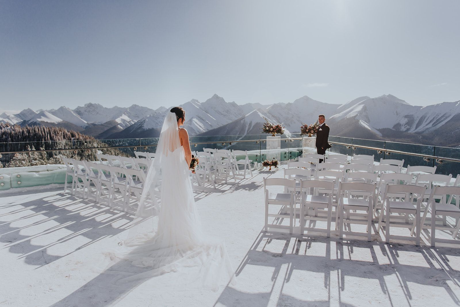 Sky Bistro Banff Wedding - Featured on Bronte Bride, winter wedding inspiration, floral ceremony installation