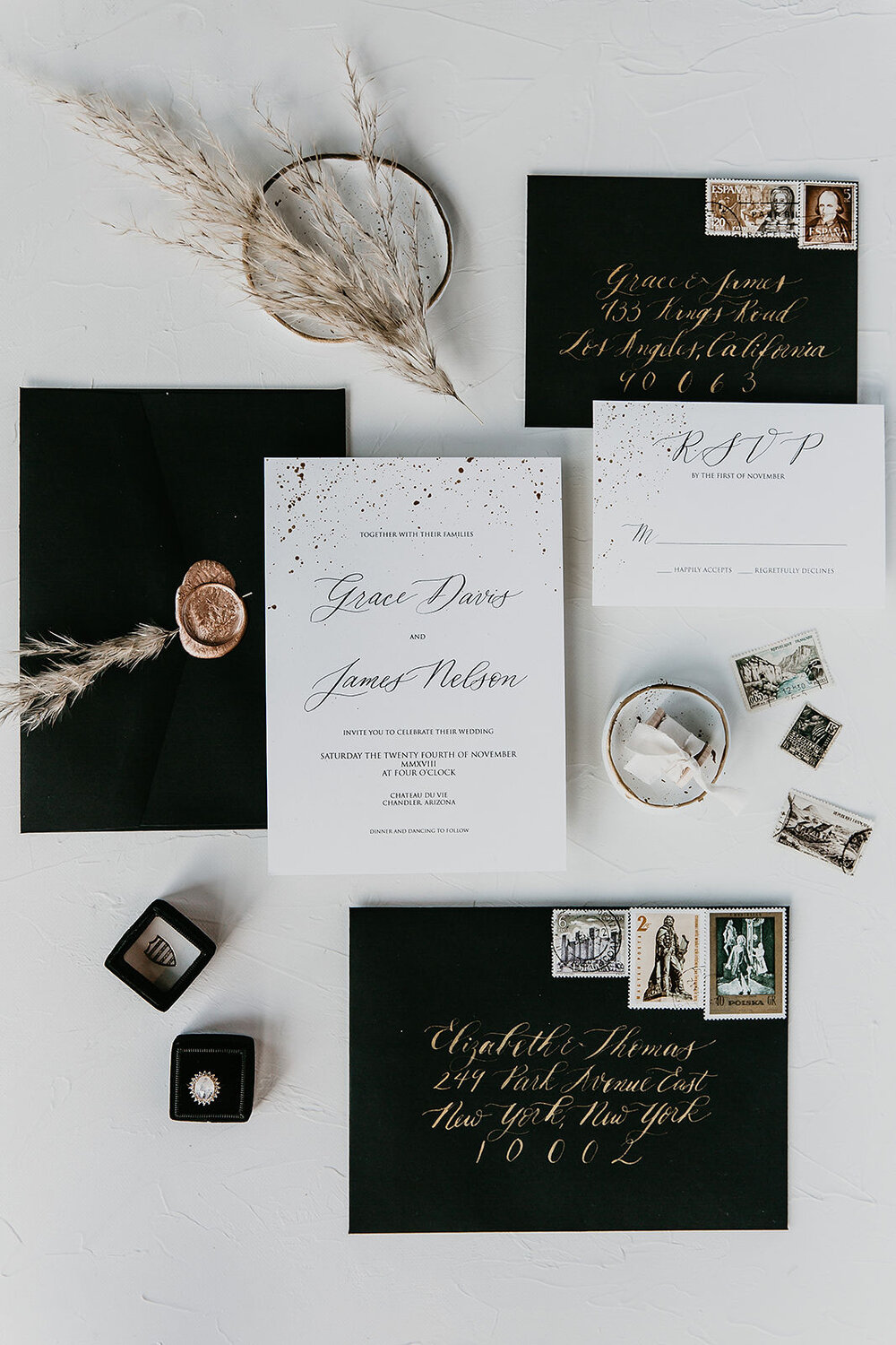 How to Plan a Themed Wedding Without Going Over the Top - Black white and gold wedding invitation suite