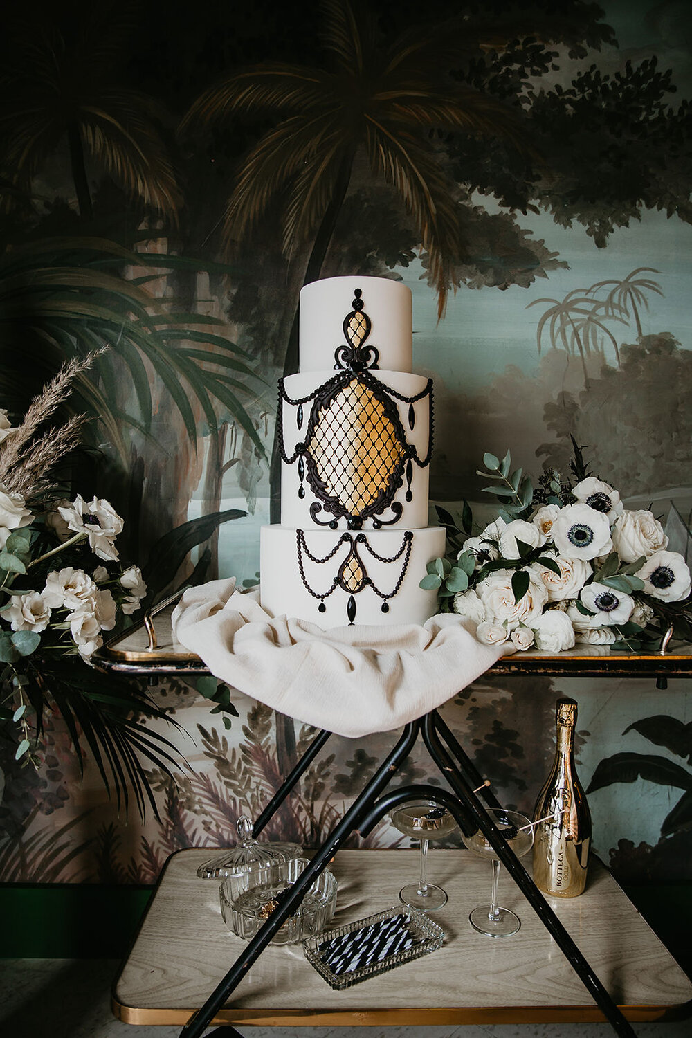 How to Plan a Themed Wedding Without Going Over the Top - vintage unique cake inspiration, gold and black wedding