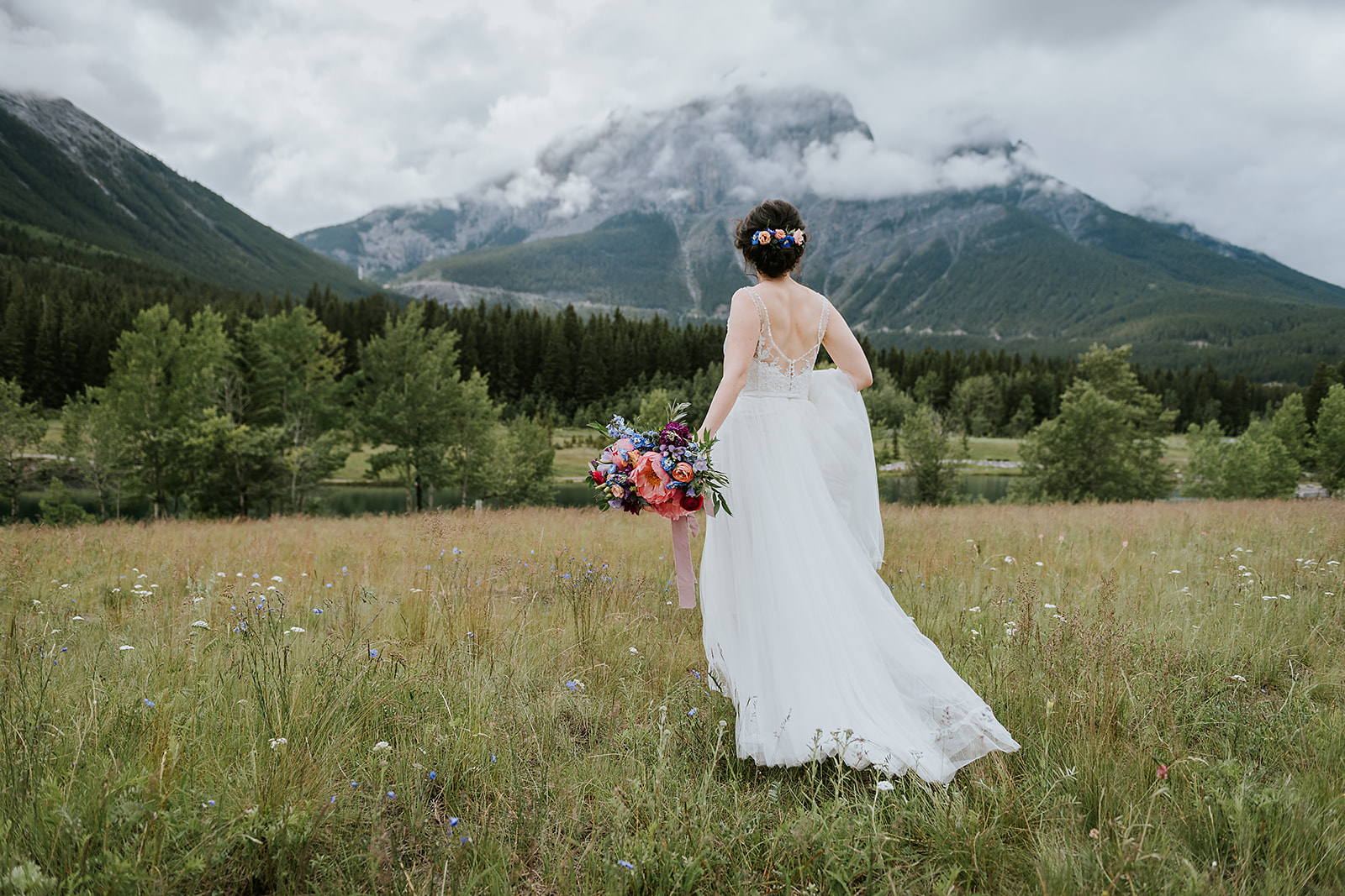 Intimate Mountaintop Wedding in Canmore With Colourful Wildflowers & Glasses of Bubbly for Each Guest - Micro Wedding Featured on Brontë Bride