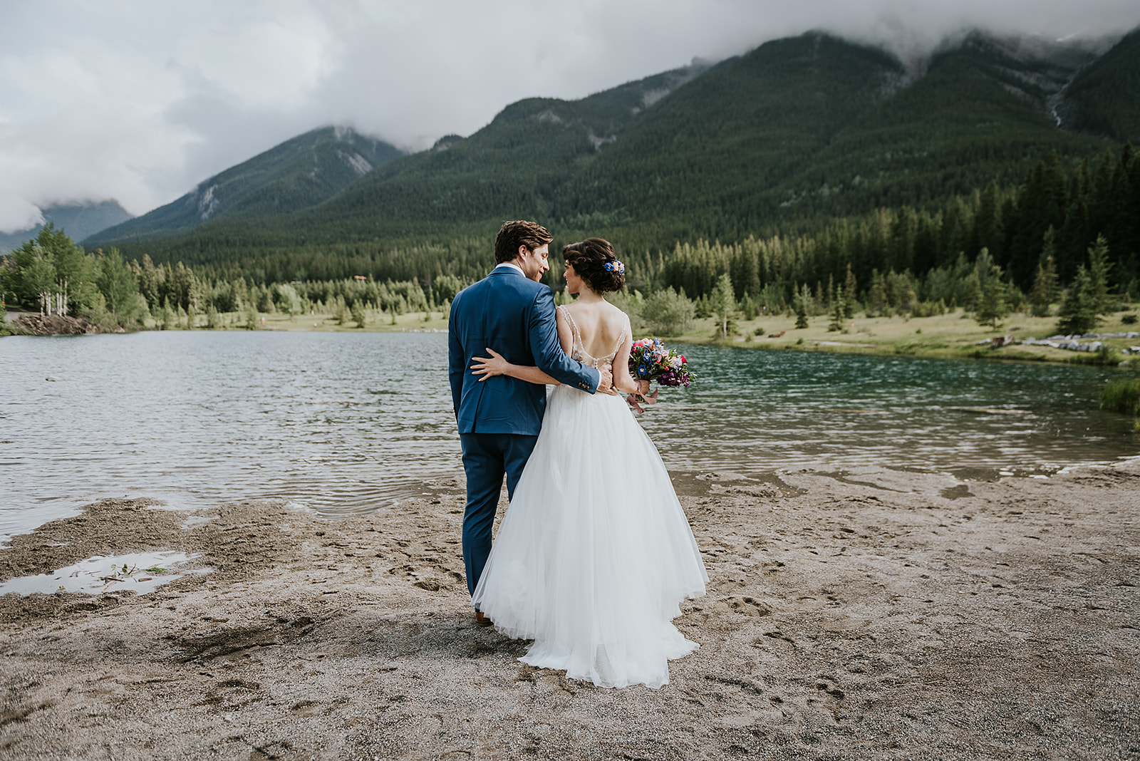 Intimate Mountaintop Wedding in Canmore With Colourful Wildflowers & Glasses of Bubbly for Each Guest - Micro Wedding Featured on Brontë Bride
