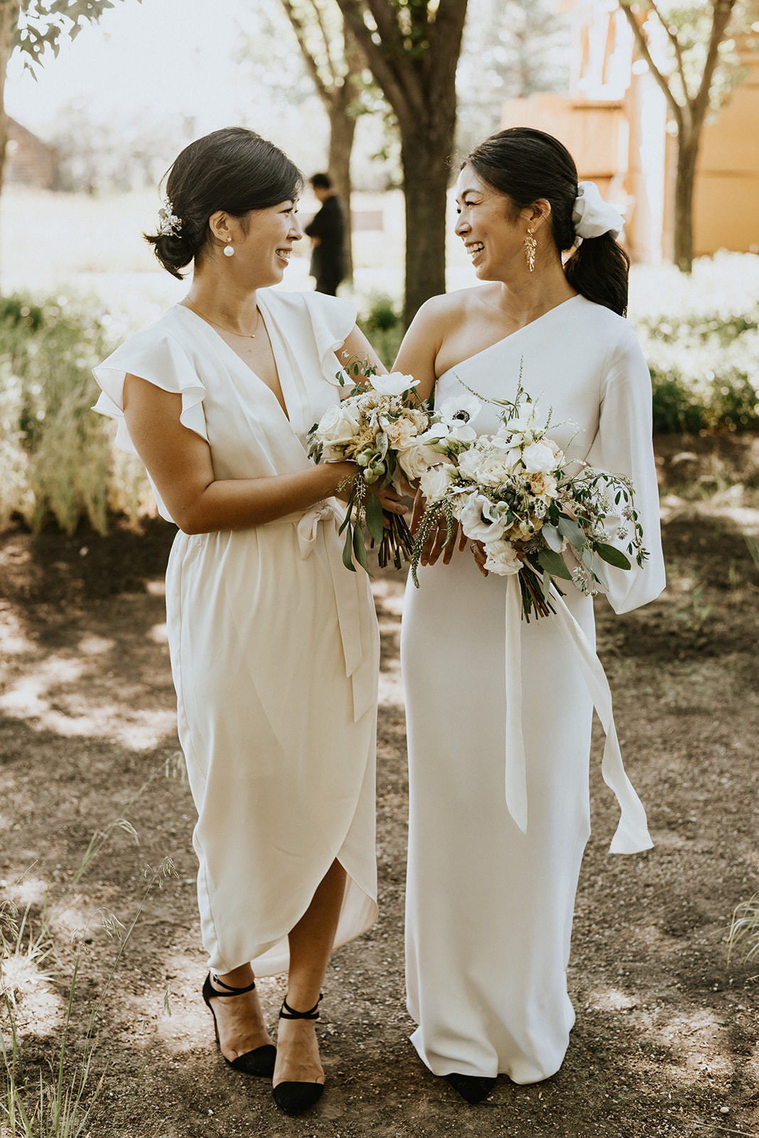 Moody Tones & Minimalist Bridal Style at This Contemporary Summer Wedding at The Coutts Centre featured on Brontë Bride White Bridesmaids Dress