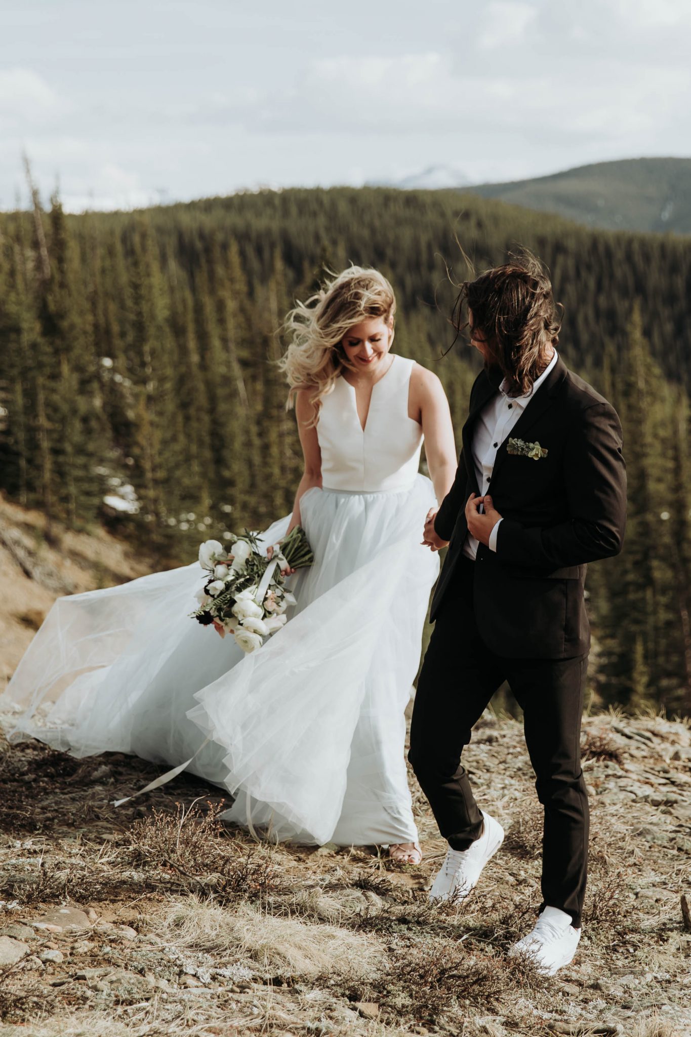 Romantic Bridal Gown Mountainous Adventure Session featuring Contemporary Attire & Alberta Views Featured on Bronte Bridë