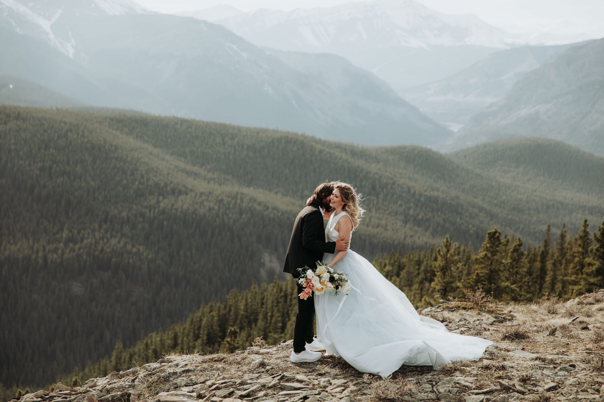 Mountainous Adventure Session featuring Contemporary Attire & Alberta Views Featured on Bronte Bridë Mountain Wedding