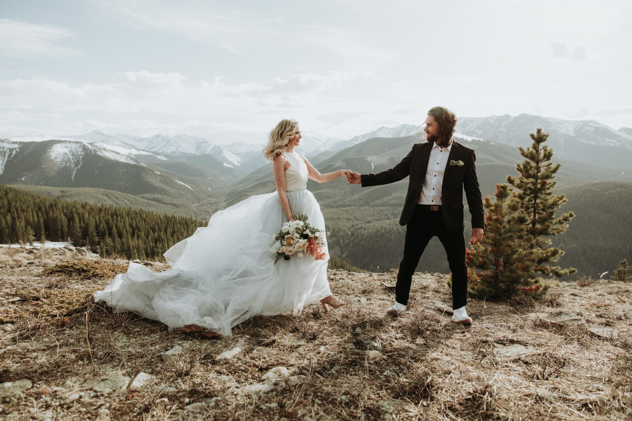Mountainous Adventure Session featuring Contemporary Attire & Alberta Views Featured on Bronte Bridë Mountain Wedding