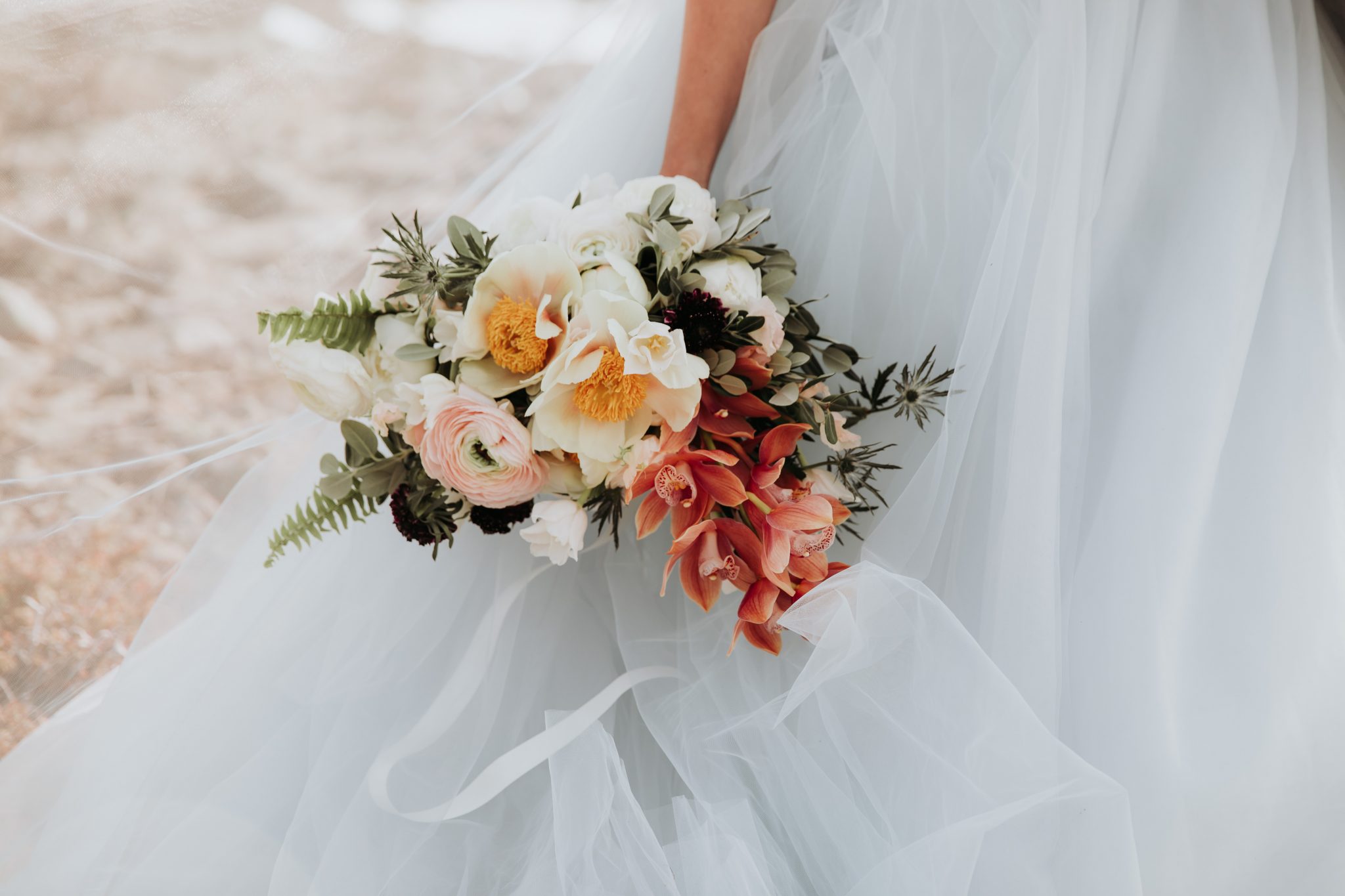 Coral and Blush Bridal Bouquet Mountainous Adventure Session featuring Contemporary Attire & Alberta Views Featured on Bronte Bridë