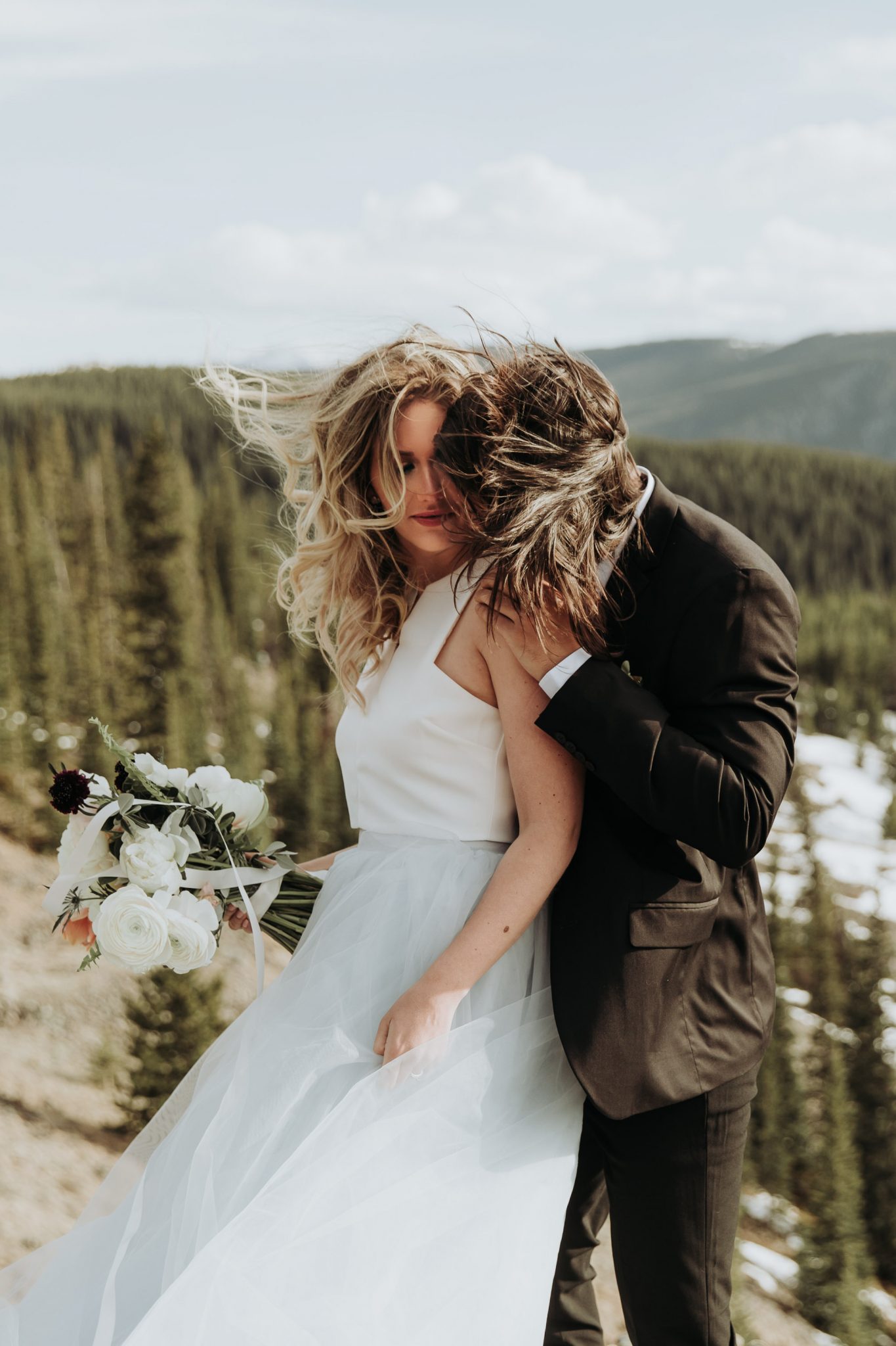 Bridal Style for a Mountainous Adventure Session featuring Contemporary Attire & Alberta Views Featured on Bronte Bridë