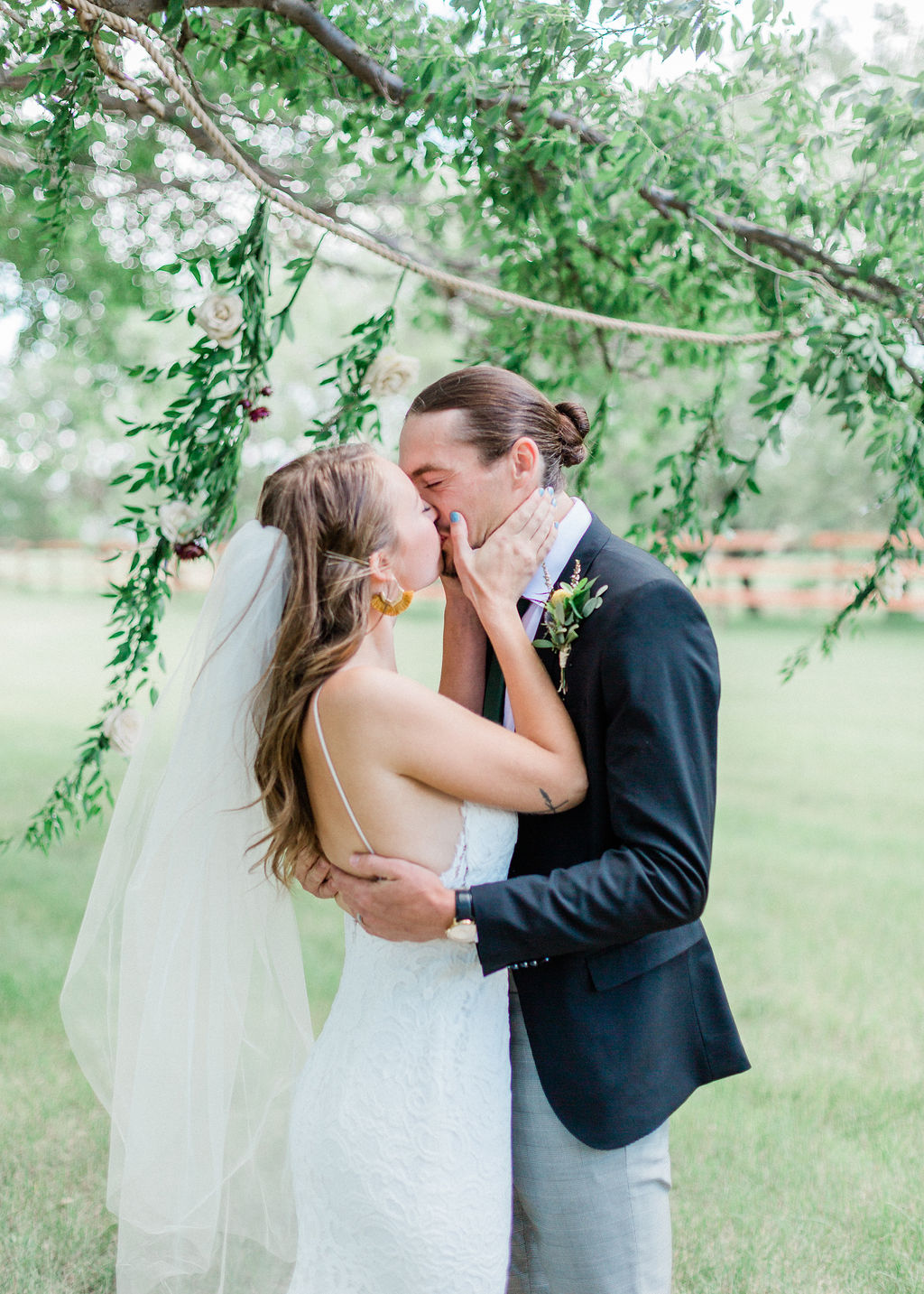 Intimate Wild Flower Wedding - outdoor wedding, first kiss, grooms attire