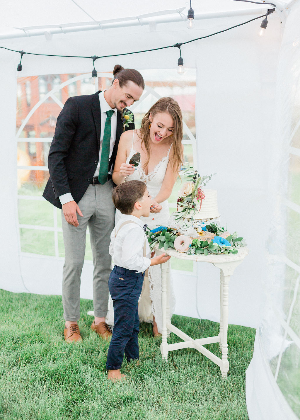 Intimate wild flower wedding - tent wedding, outdoor wedding, cake cutting