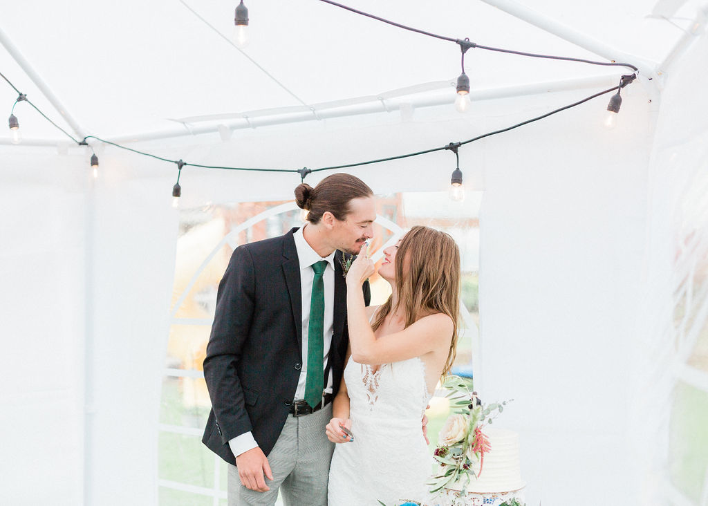 Intimate wild flower wedding - tent wedding, outdoor wedding, cake cutting