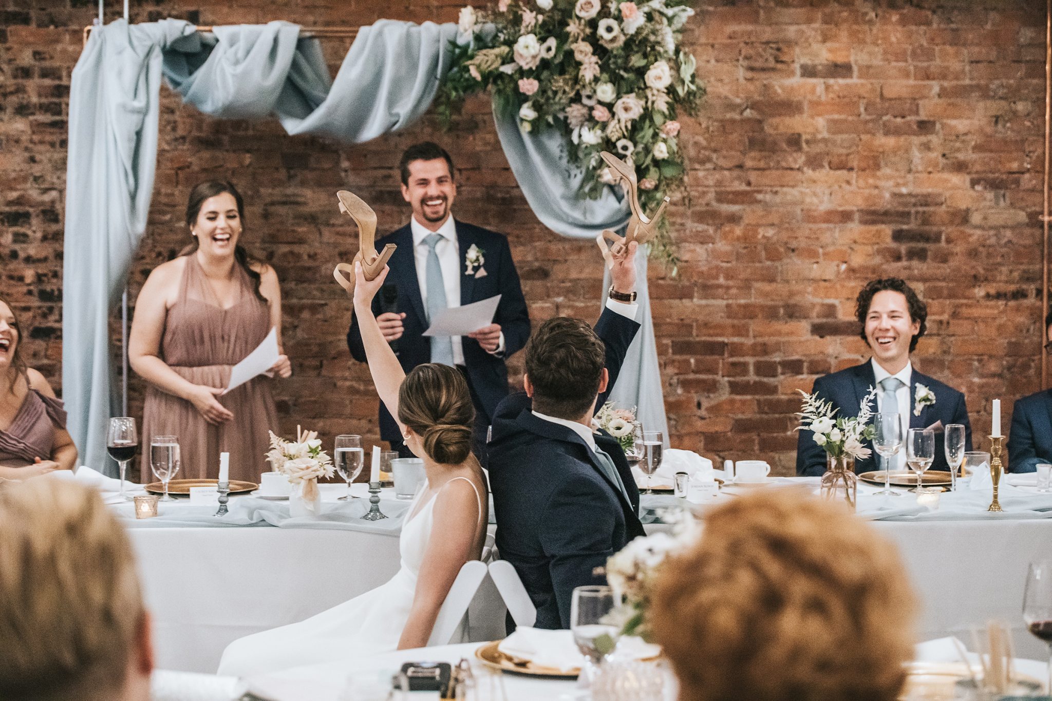 This Couple Decided To Split Up Their Celebrations with A Double-Header Wedding at Venue 308 Featured on Brontë Bride, shoe game, wedding reception