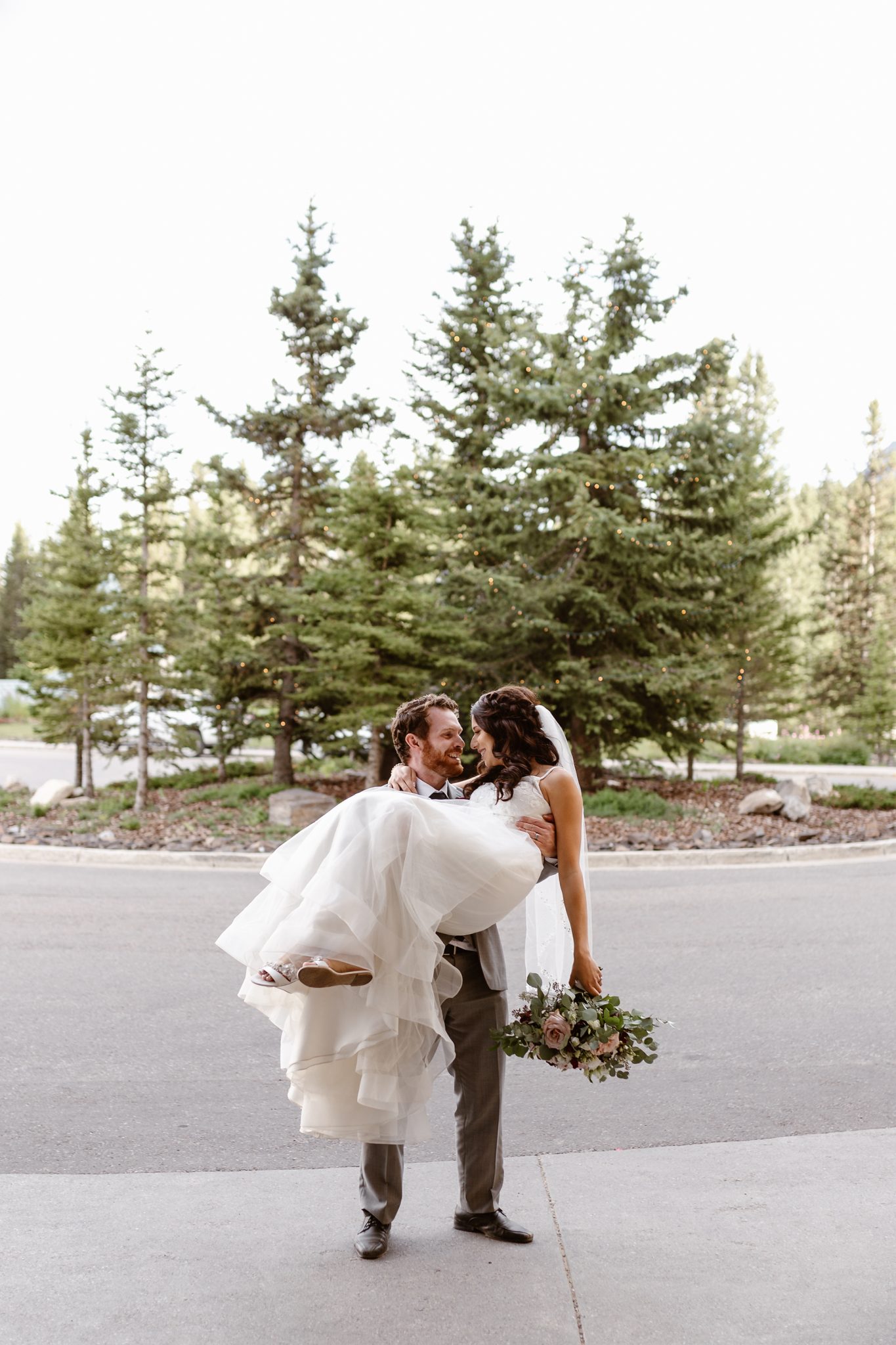 Downsized Covid 19 wedding at Chateau Lake Louise - bride and groom, wedding bouquet 