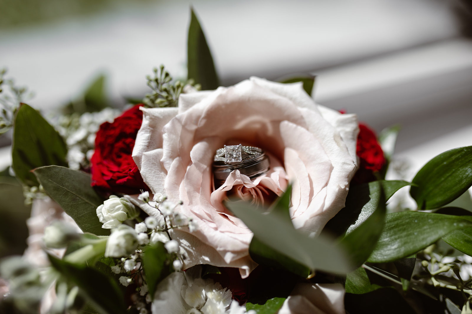 This Couple Ended up Loving Their Downsized Wedding at Fairmont Lake Louise - engagement ring, wedding rings