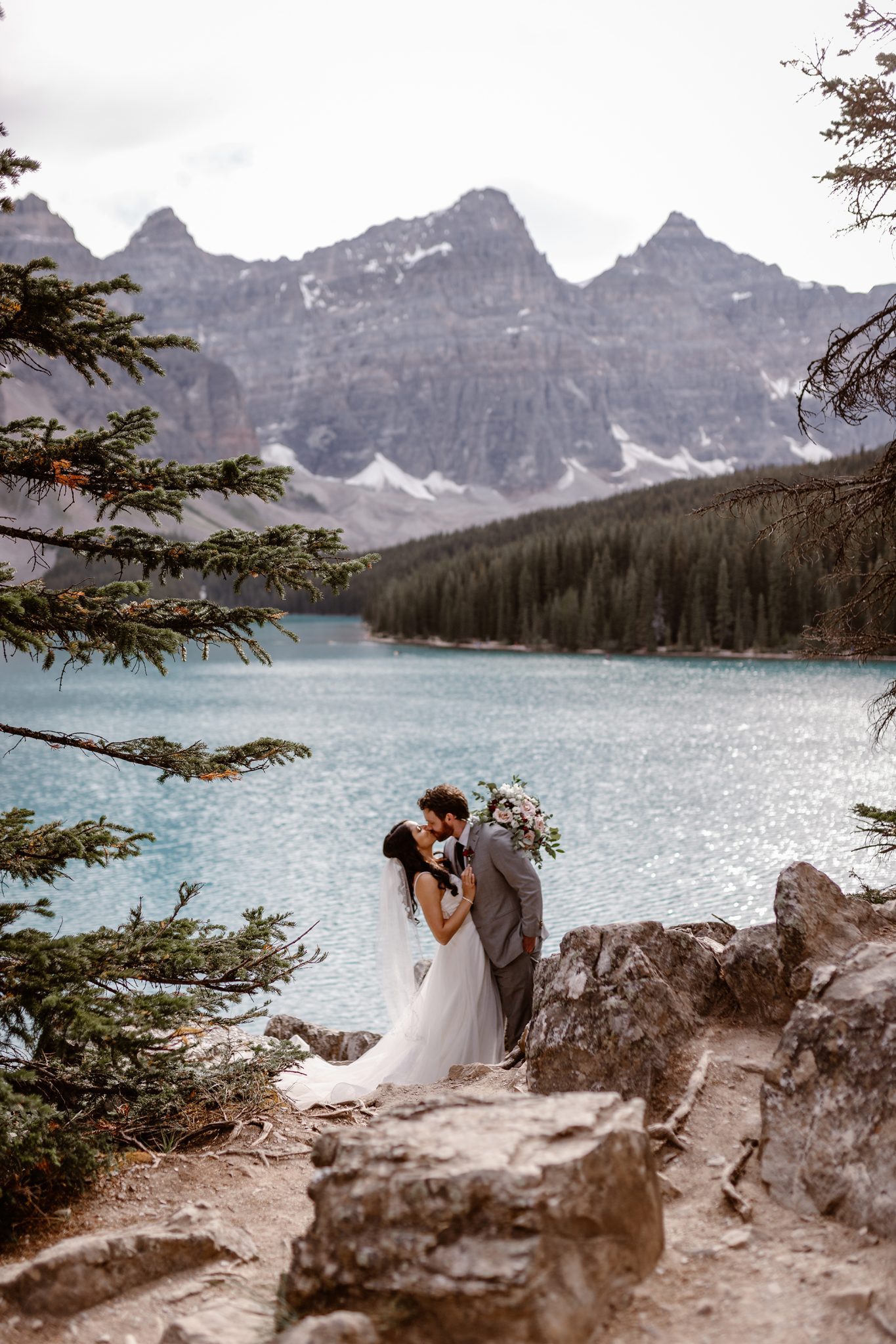 This Couple Ended up Loving Their Downsized Wedding at Fairmont Lake Louise - moraine lake, rocky mountain wedding, bride and groom