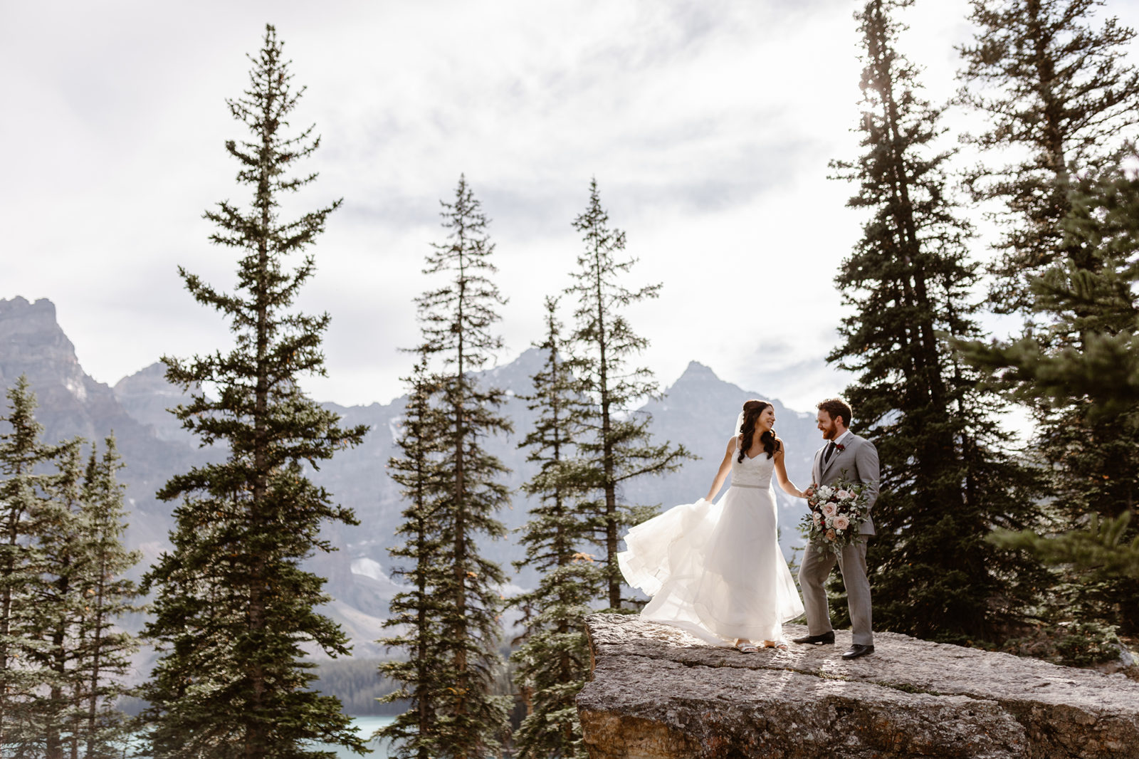 This Couple Ended up Loving Their Downsized Wedding at Fairmont Lake Louise - moraine lake, bride and groom