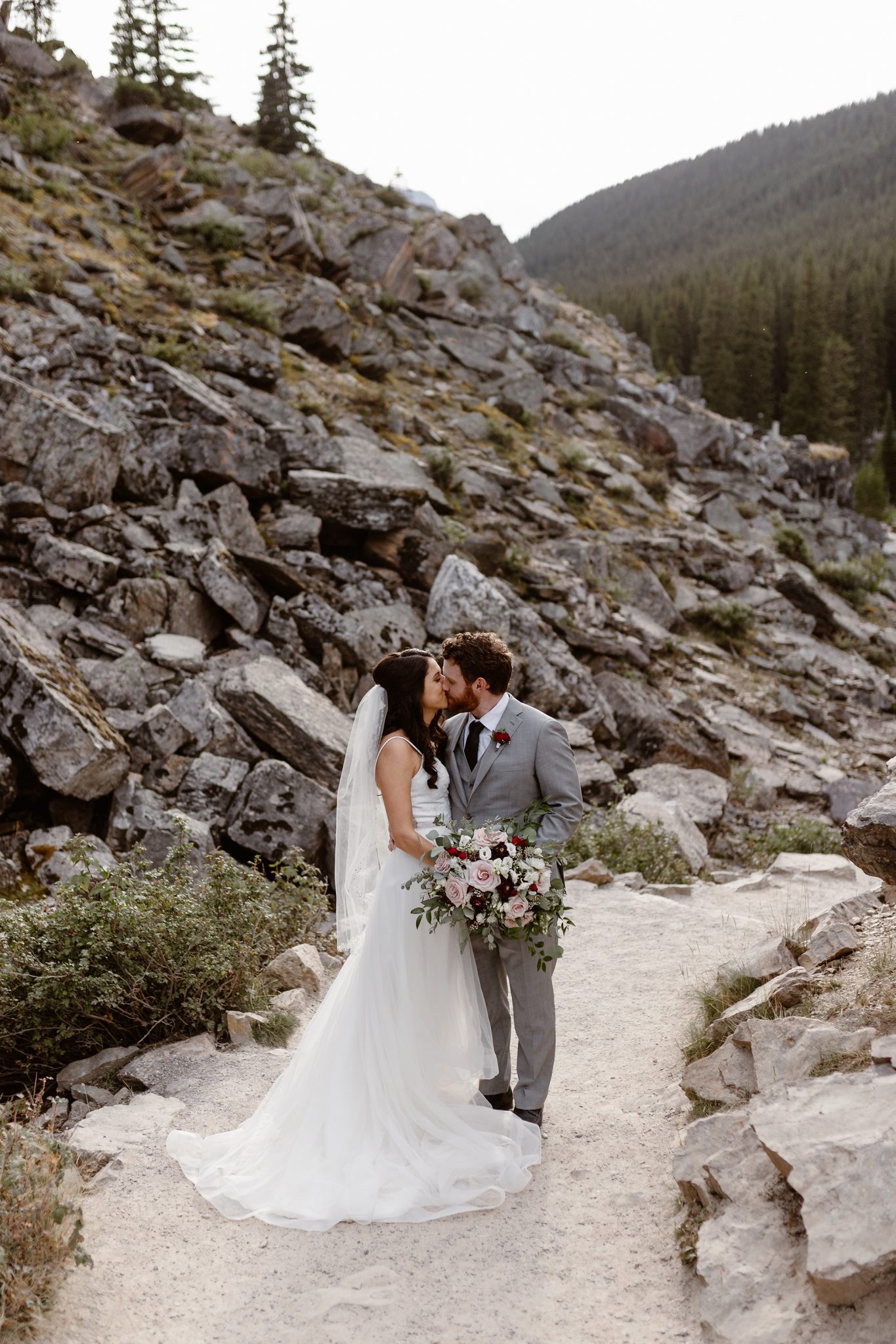 This Couple Ended up Loving Their Downsized Wedding at Fairmont Lake Louise - rocky mountain wedding, bride and groom
