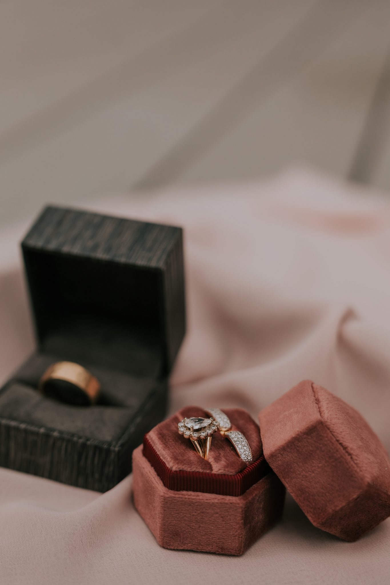 Covid wedding in the rain, wedding rings, engagement ring, velvet ring boxes