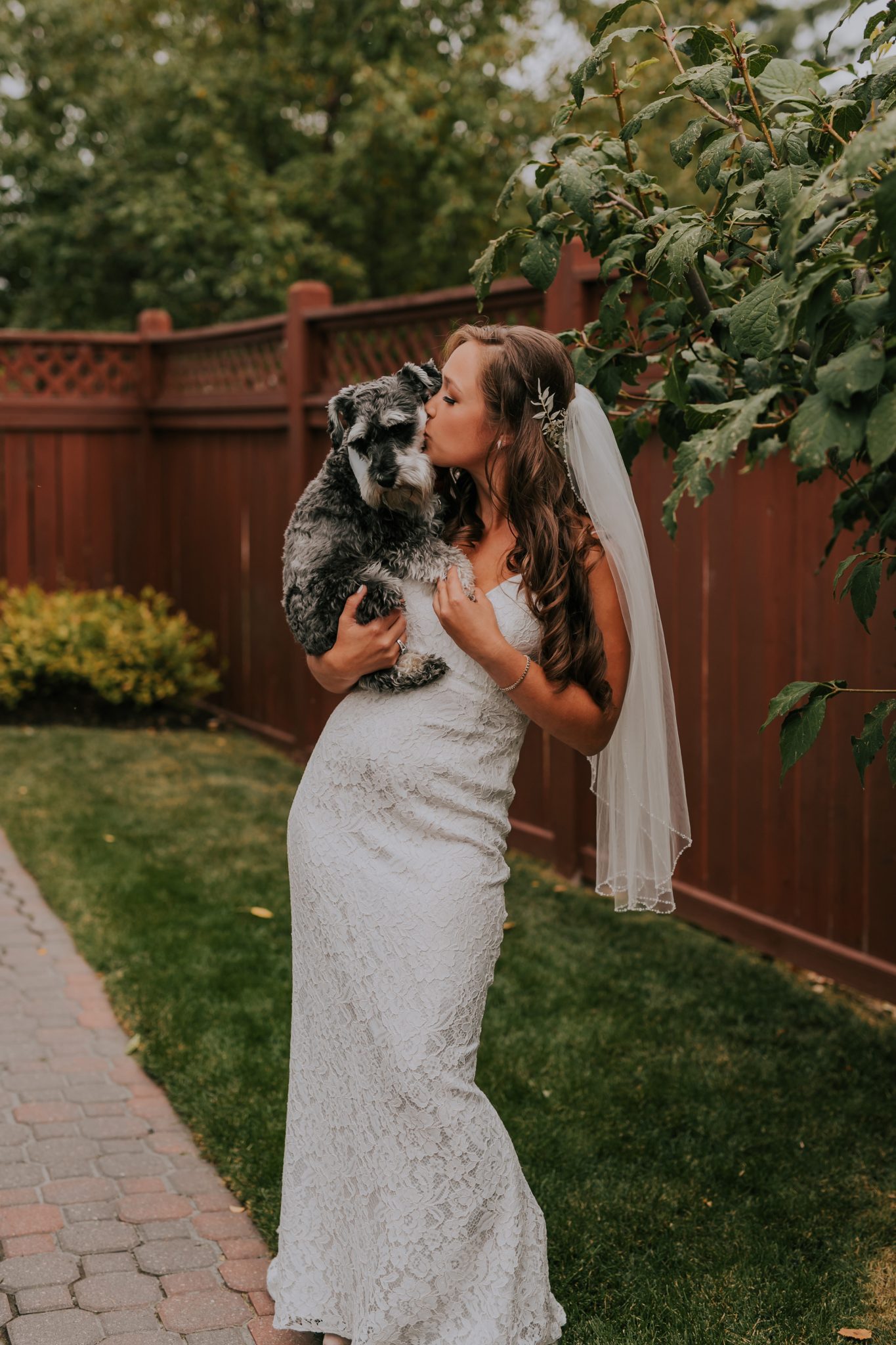 Bride and her dog on her wedding day, bridal portrait, wedding dress