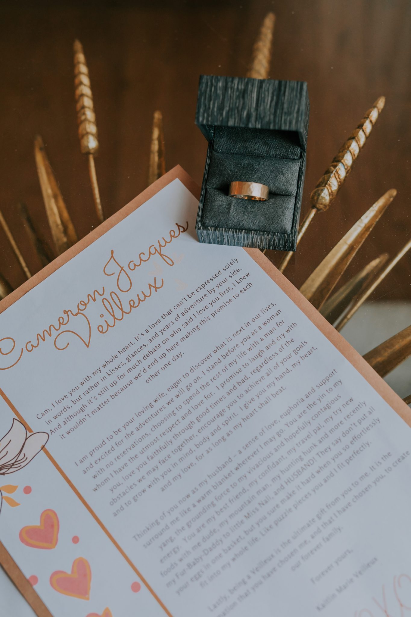 A Little Bit of Rain and Covid Restrictions weren't about to Slow This Couple Down! Featured on Brontë Bride, wedding ring, wedding stationery