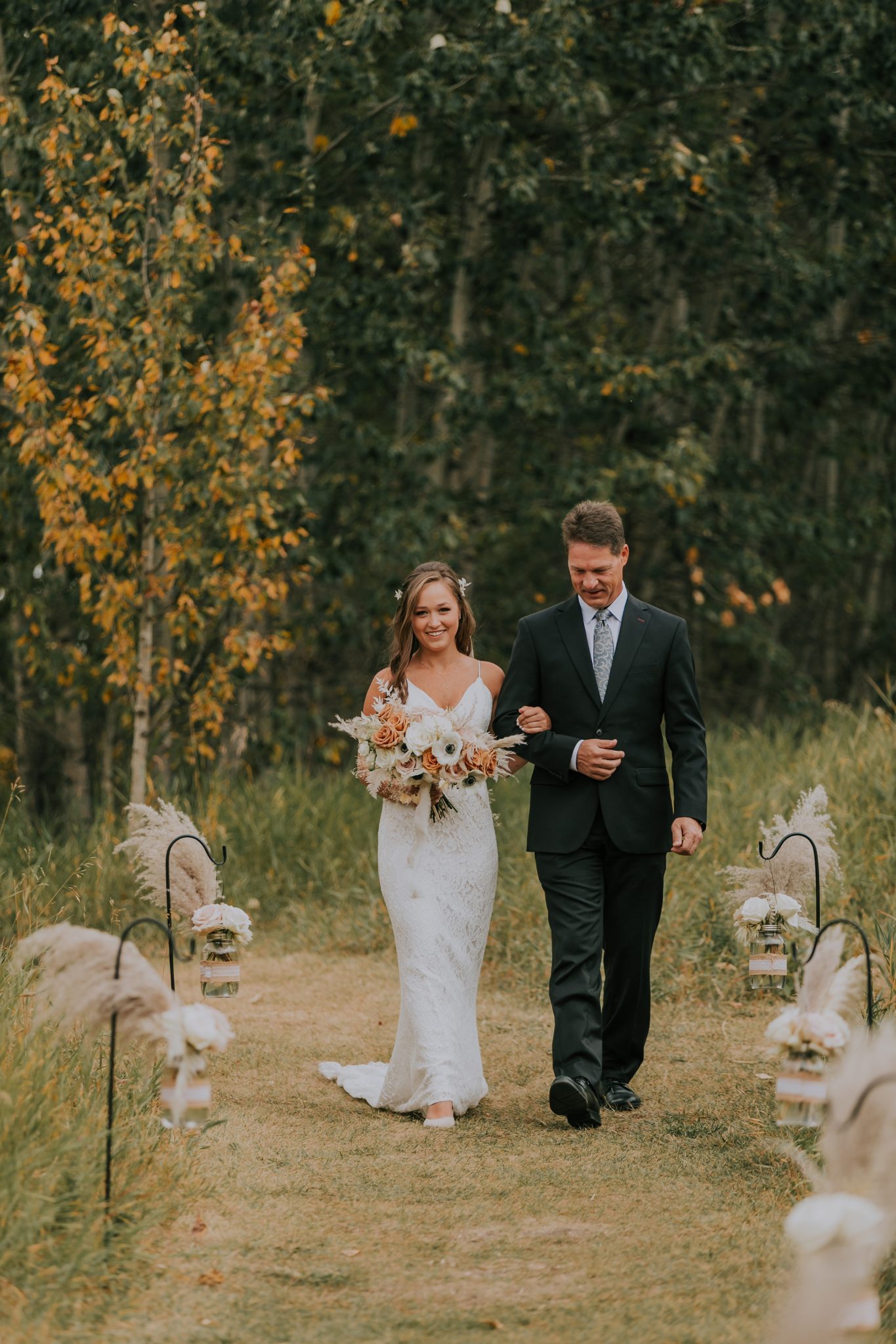 A Little Bit of Rain and Covid Restrictions weren't about to Slow This Couple Down! Featured on Brontë Bride, fall wedding, wedding ceremony inspiration