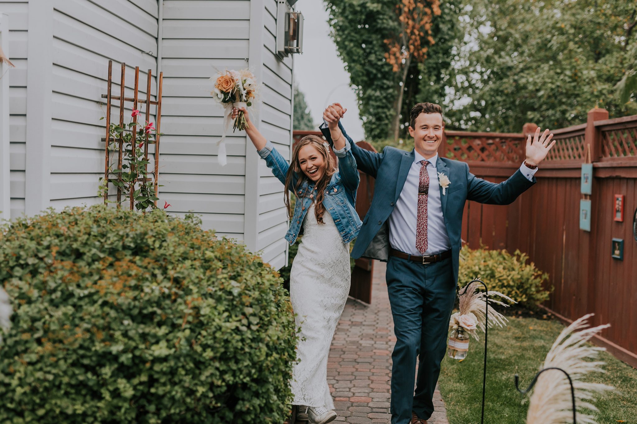 A Little Bit of Rain and Covid Restrictions weren't about to Slow This Couple Down! Featured on Brontë Bride, backyard wedding, wedding reception