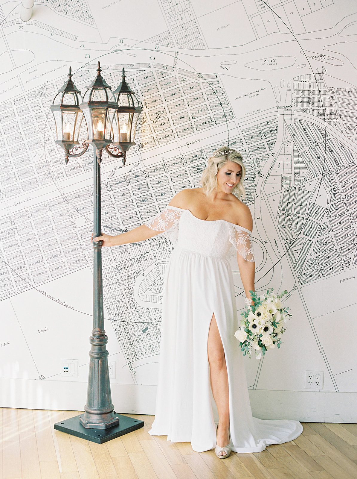 Craving a Paris Getaway? This Parisian Wedding Inspiration Will Transport You To a Quaint Town In France Featured by Brontë Bride, off the shoulder wedding dress, anemone bouquet 