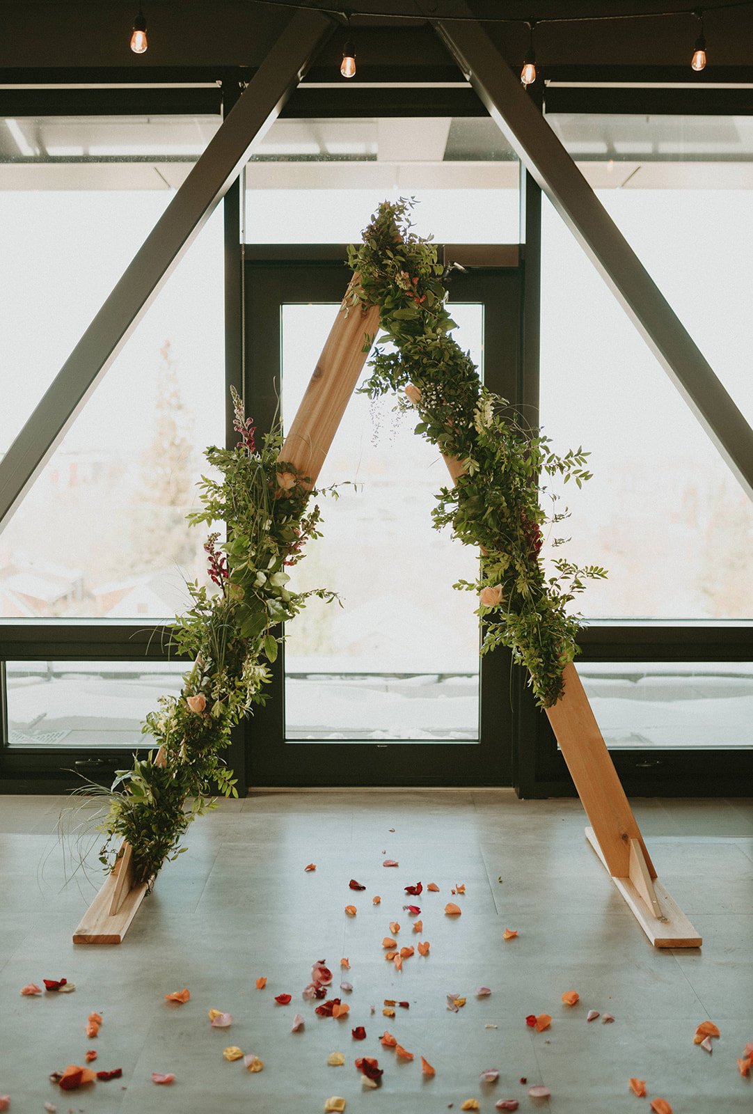 This Minimalist Micro-Wedding features a DIY Bouquet Made by the Bride Herself -triangle arch, wedding arch, modern wedding