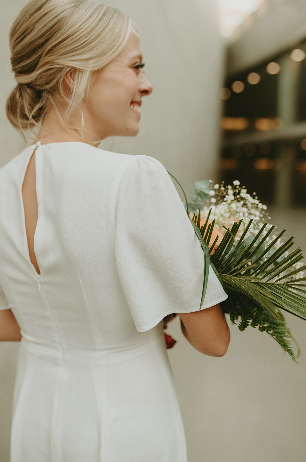 This Minimalist Micro-Wedding features a DIY Bouquet Made by the Bride Herself - crepe wedding dress, bridal bouquet