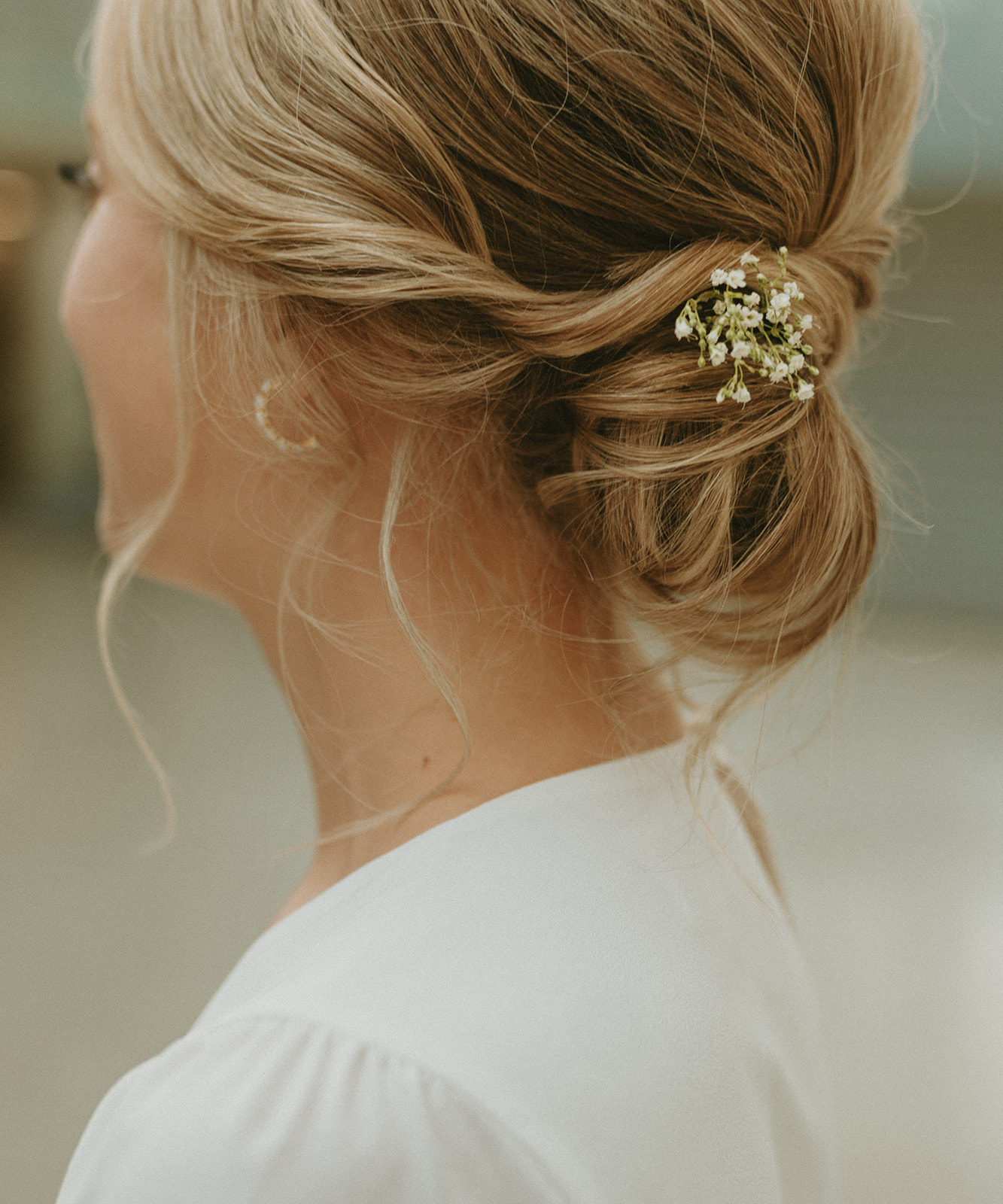 This Minimalist Micro-Wedding features a DIY Bouquet Made by the Bride Herself - updo, wedding hair, bridal style