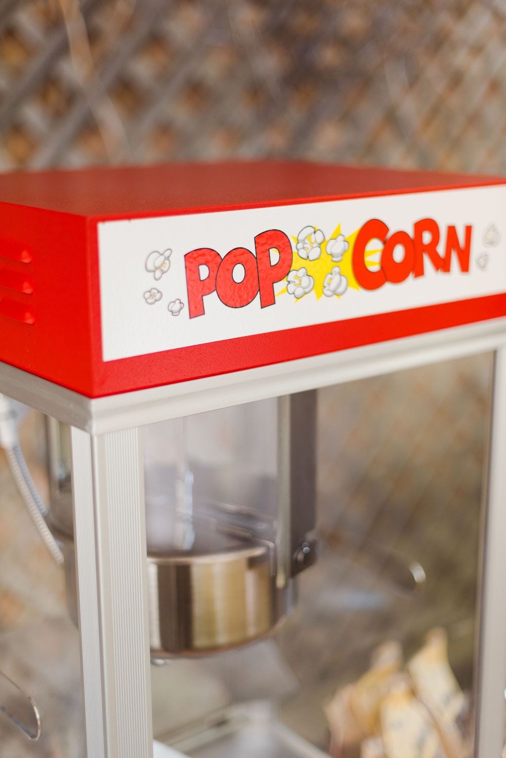 A popcorn machine photographed as a part of a Calgary Alberta wedding reception