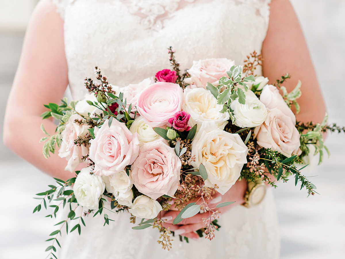bridal bouquet with hanoi clooney ranunculus (blush ranunculus), white ranunculus, White O'Hara garden roses, Faith roses, Quicksand roses, pink leptospermum, pink lisianthus and ivory majolica spray roses