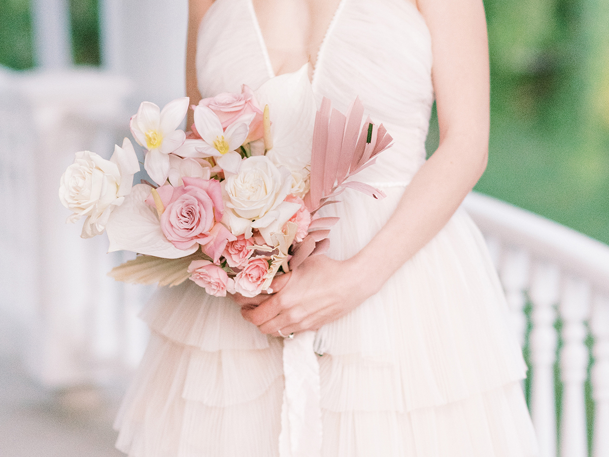 Blush bridal bouquet with Pink Majolica Spray roses, White Playa Blanca Roses, Faith Roses, and White Anthurium