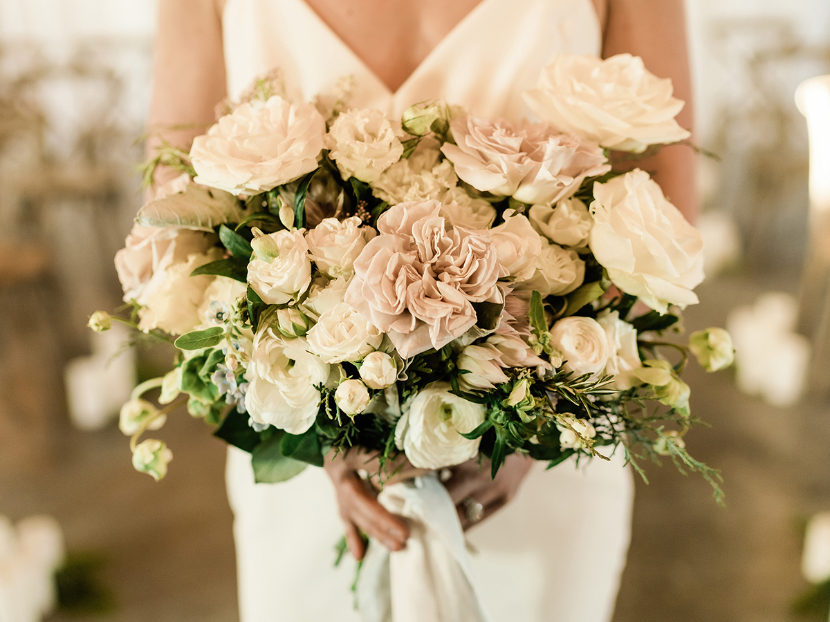 Blush Bridal Bouquet featuring Westminster Abby Roses, Blushing Bride Protea, and Ivory Lisianthus