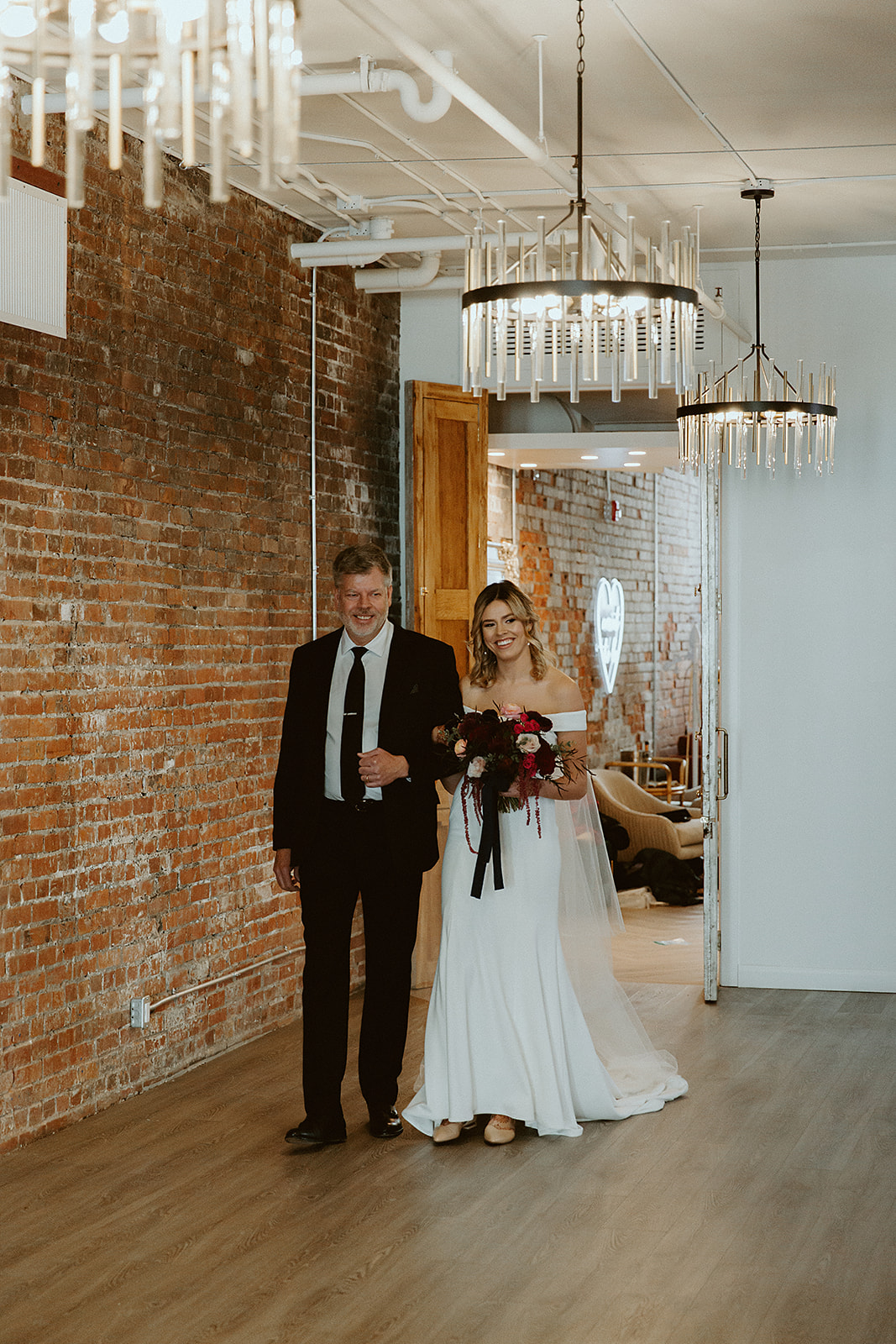 Minimony wedding ceremony at Venue 308, a father and bride walk down the aisle 