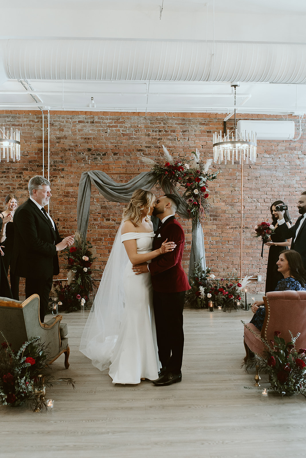 Bride and groom share their first kiss 