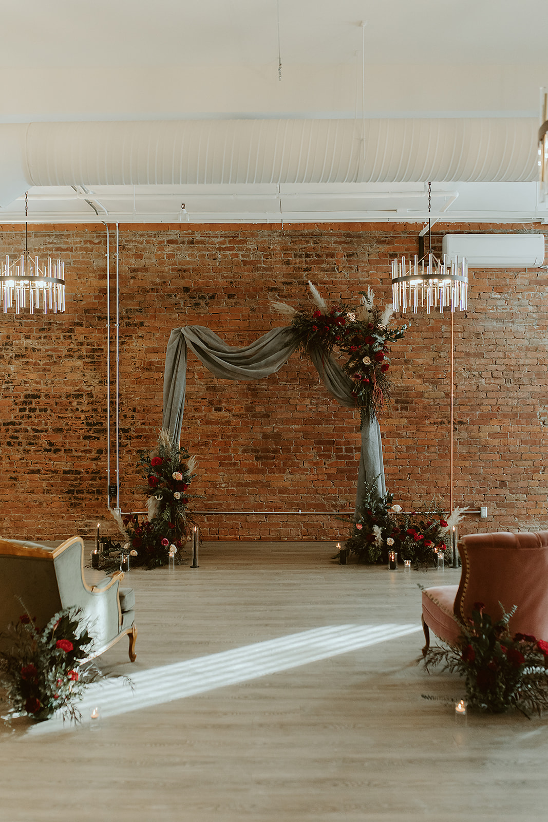 Boho wedding decor with green accents and rich jewell tones at Venue 308