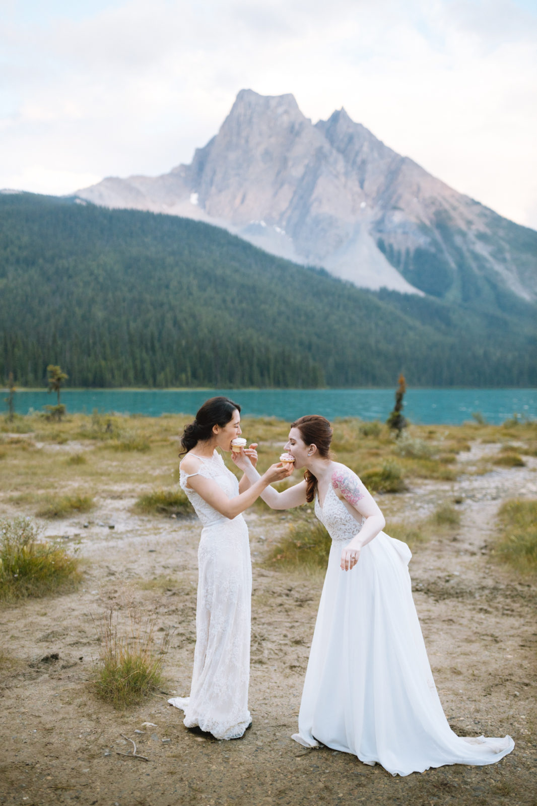 Newly wed couple enjoys cupcakes to celebrate their Elopement in Yoho National Park