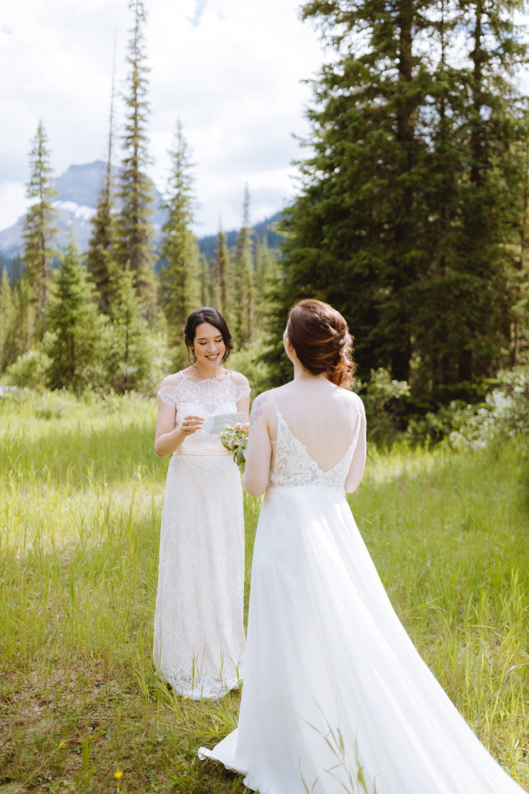 Two brides share their vows in a meadow for their Elopement in Yoho National Park