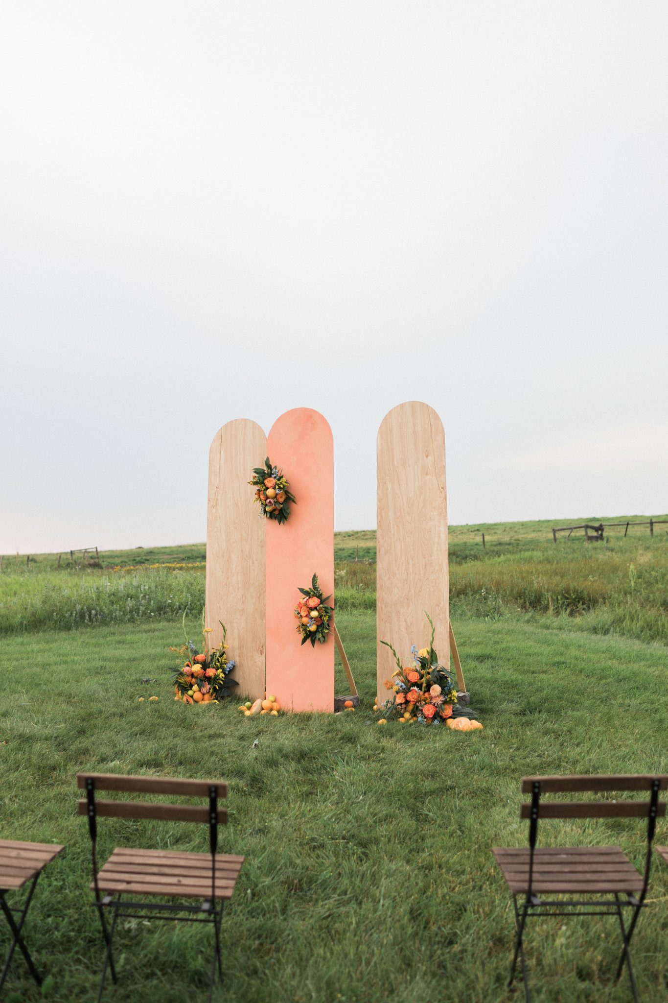 Ceremony backdrop panels for this garden inspired wedding at The Gathered