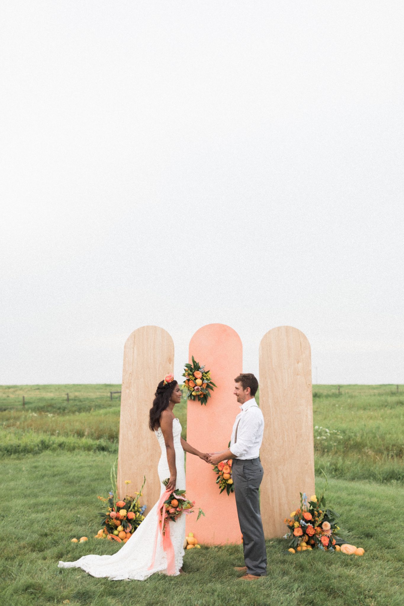 Garden inspired wedding ceremony at The Gathered with ceremony panels
