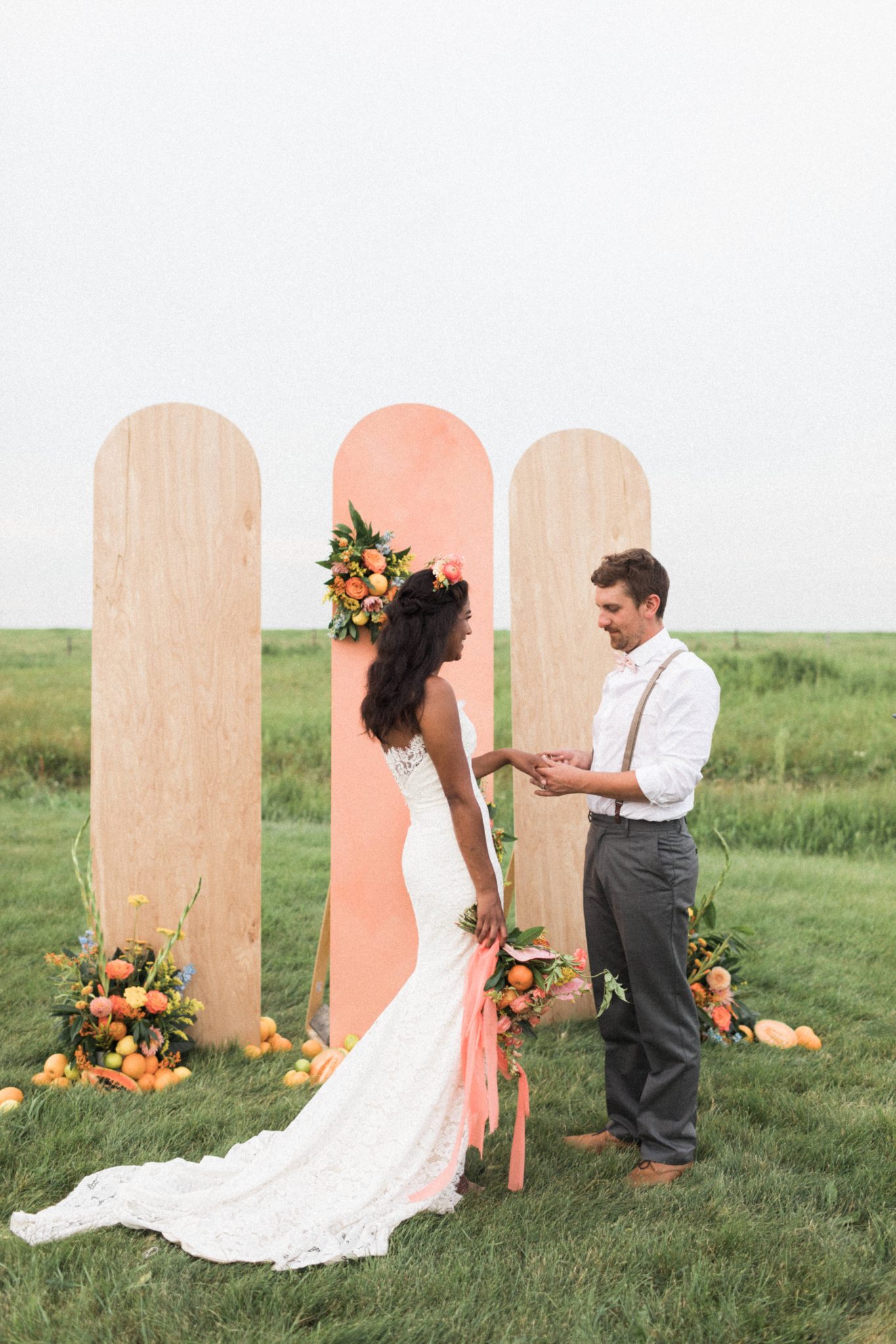 Garden inspired wedding with ceremony backdrop panels at The Gathered an Alberta wedding venue