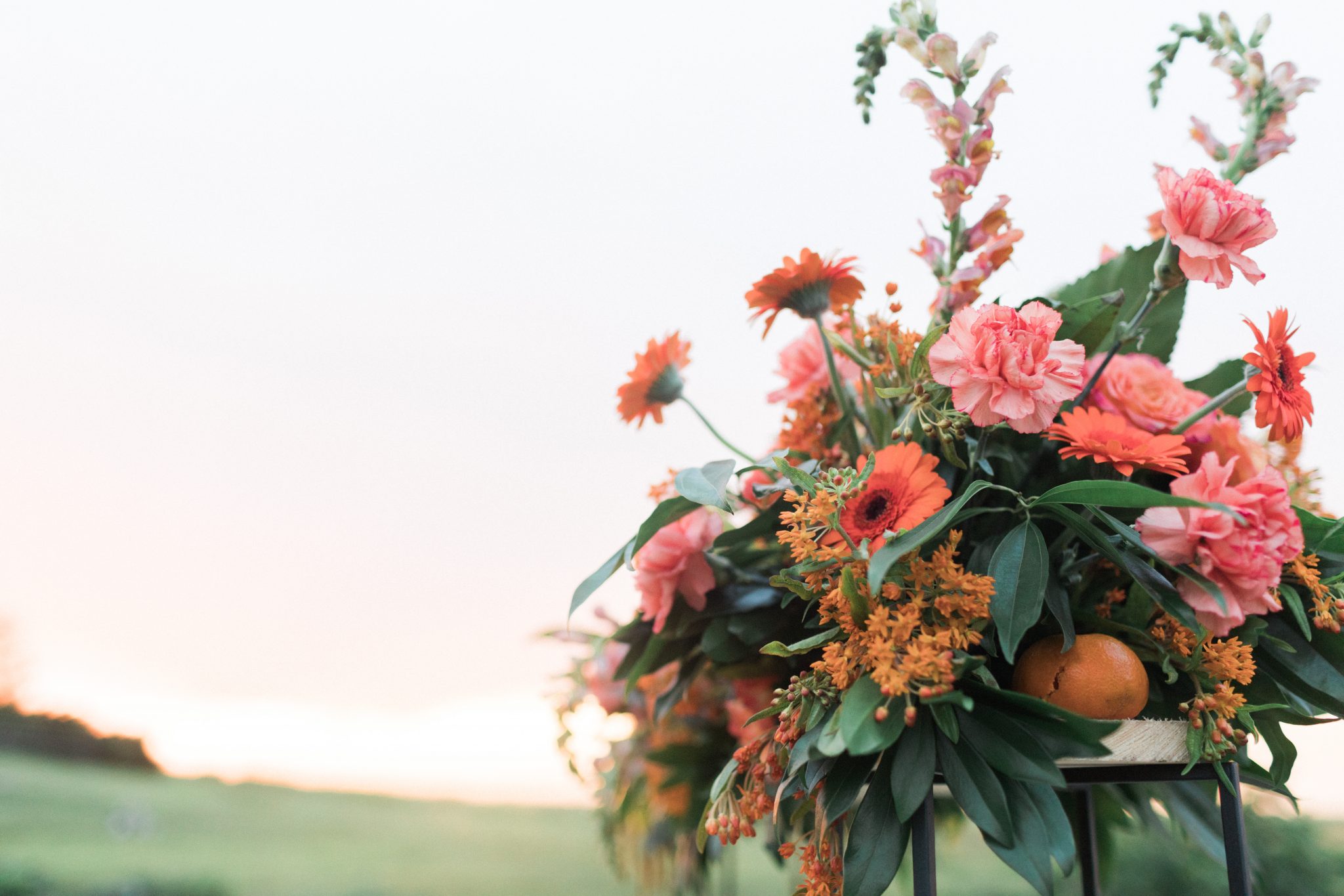 Wedding flowers featuring pink and orange blooms