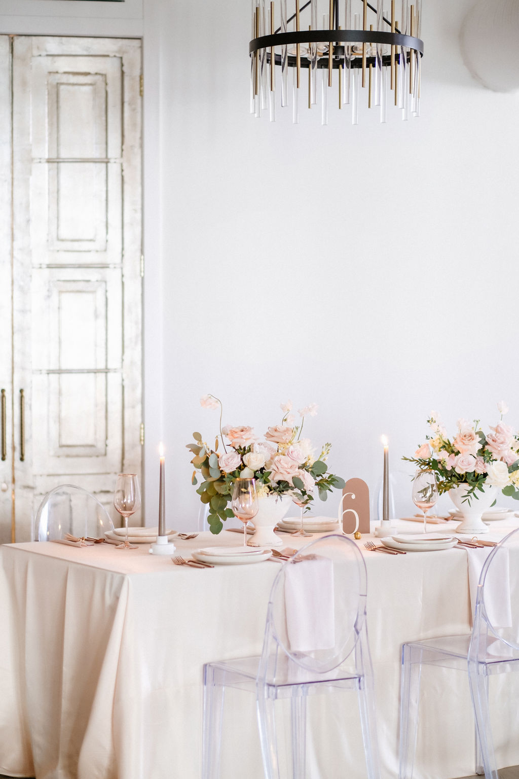 Contemporary wedding styling at Venue 308 featuring pink and orange floral design