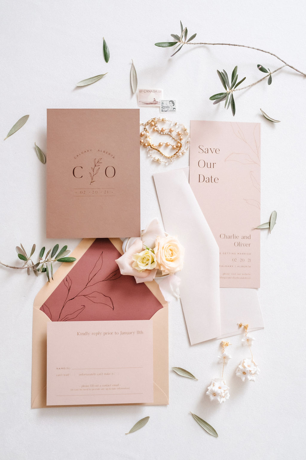 Wedding stationery for contemporary wedding inspiration with pink, red and sand colours