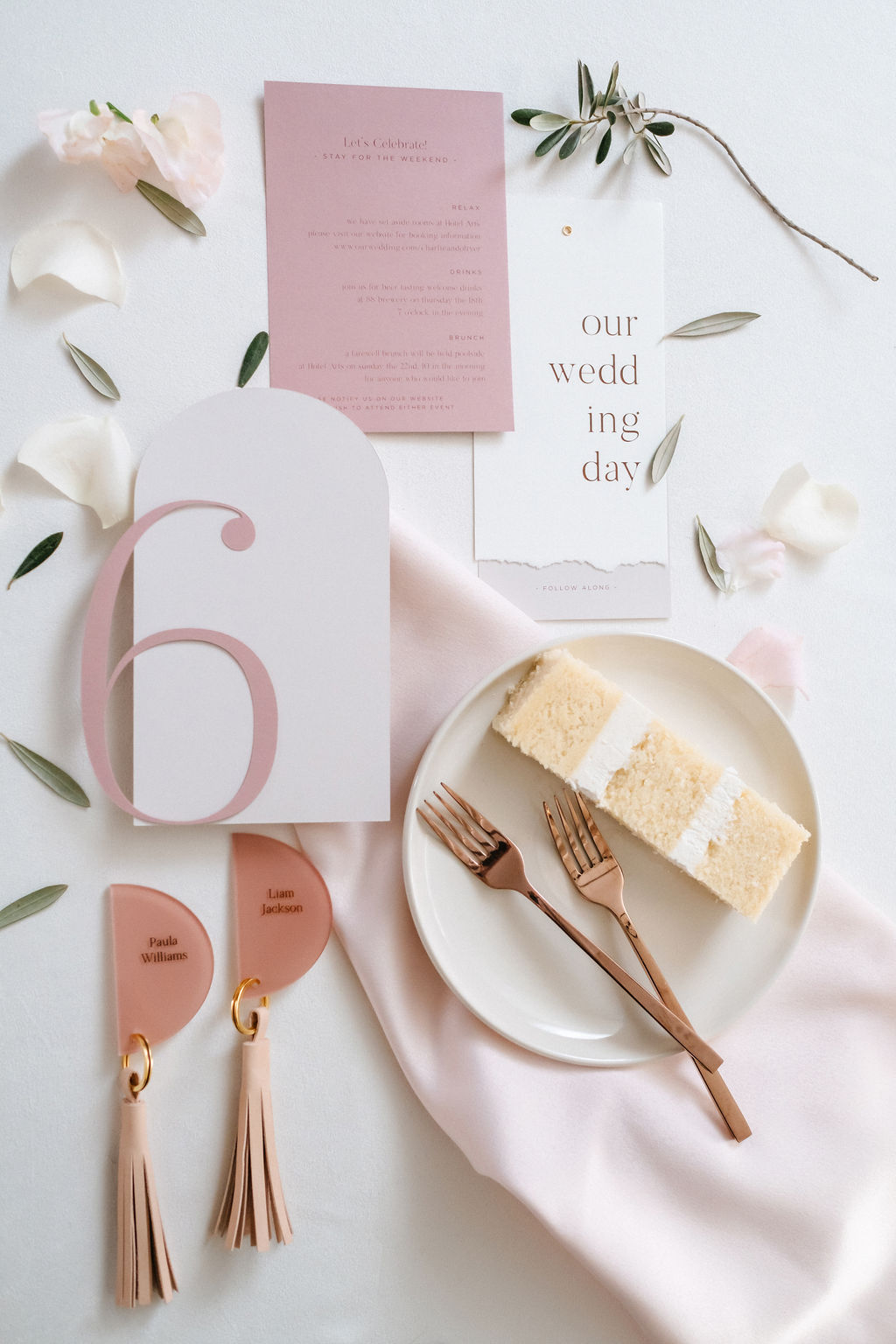 Styled place settings for a contemporary wedding with a pink wedding palette