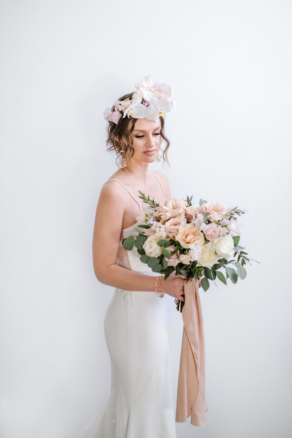Contemporary wedding inspiration with a bride in an orchid flower crown by Creative Edge Flowers