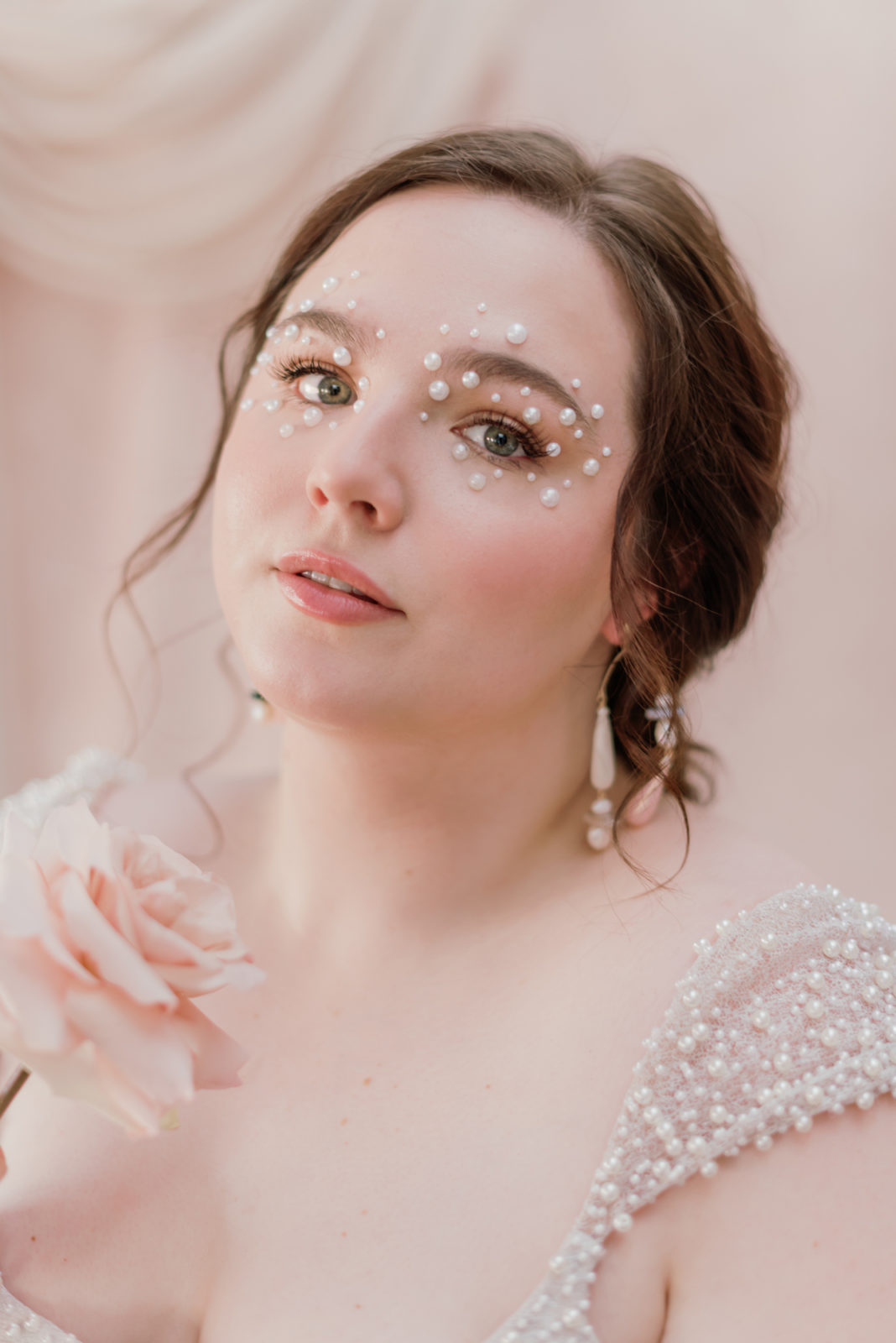 Bridal inspiration for romantic pearl themed eye makeup to match a pearl studded gown