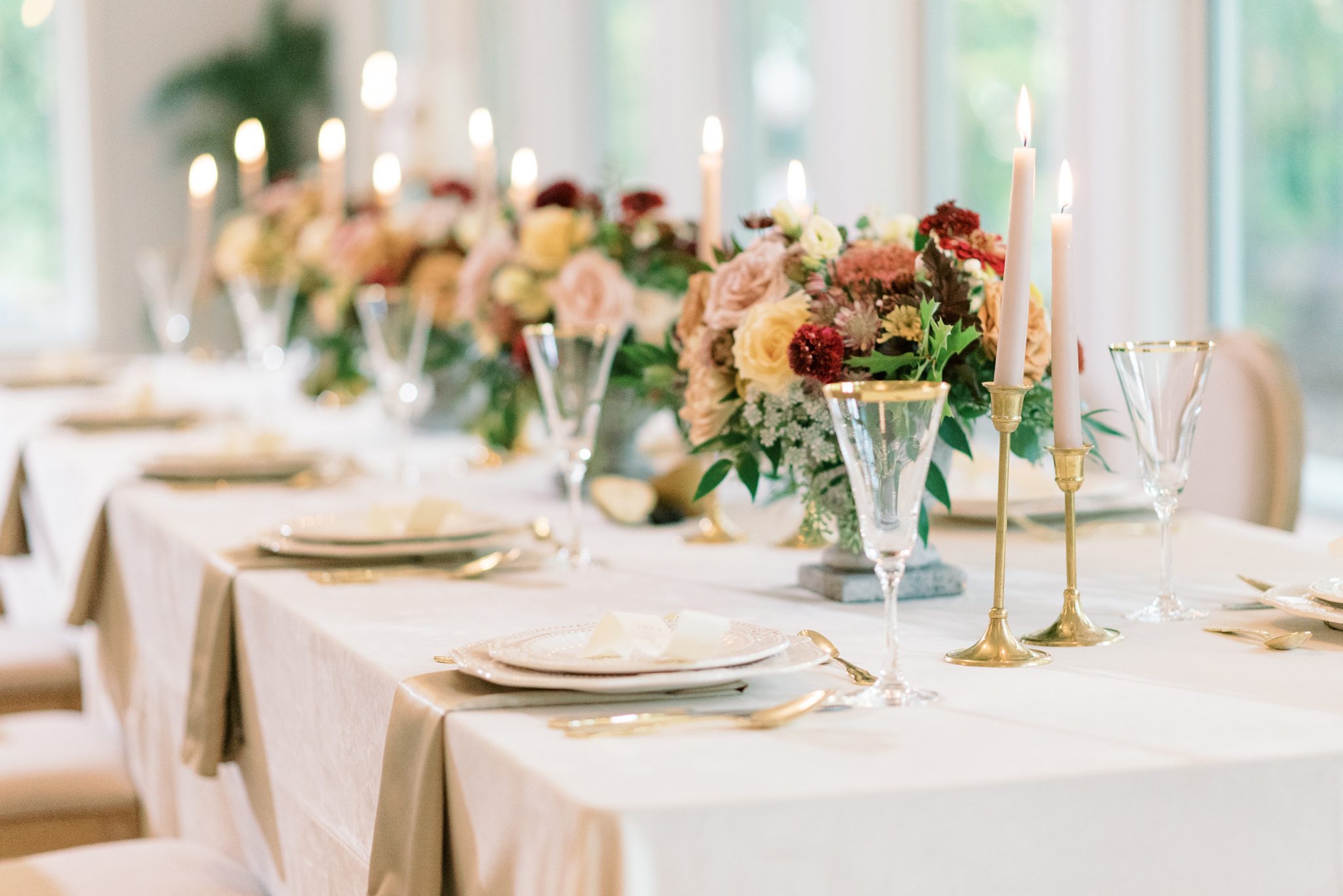 An enchanting tablescape with florals in berry hues at Norland Historic Estate