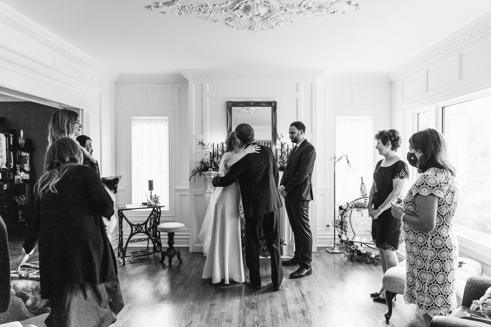 Black and white ceremony portrait of a living room minimony