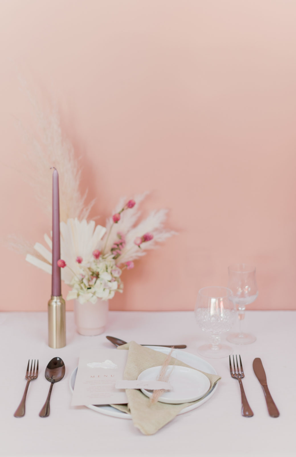 Modern microwedding inspiration with pink and berry hues and dried florals